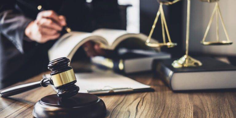 lawyer judge counselor working with agreement contract courtroom